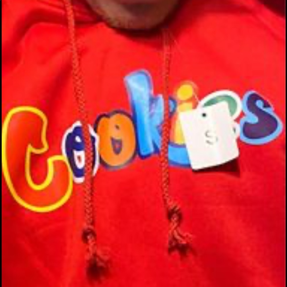 Red size small cookies shirt never worn tried in and was too small